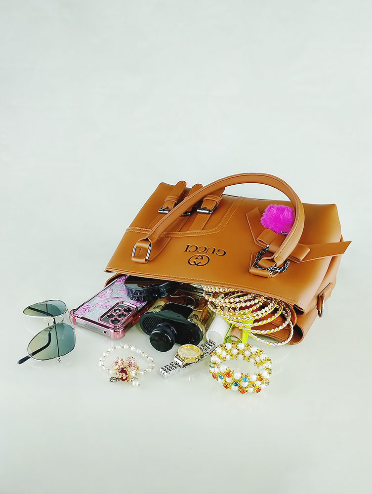 Light Brown Faux Leather Handbag – Triple Buckle Design with Pink Charm